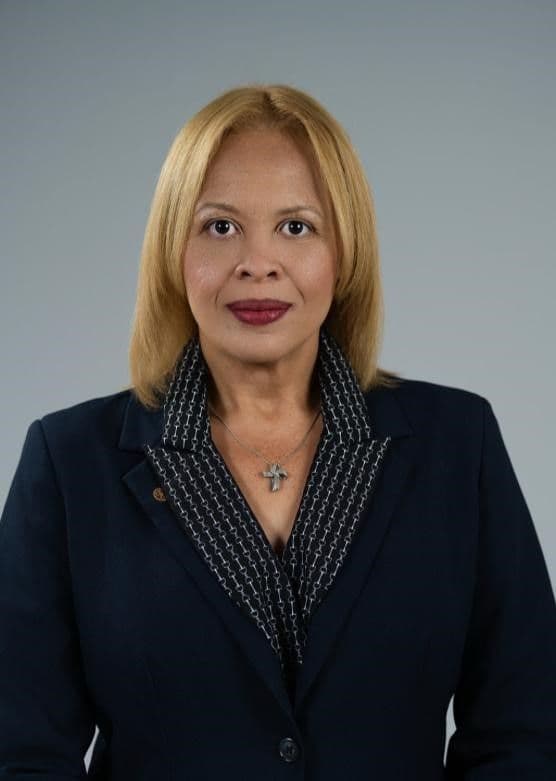 Acting President Ms. Nanalie Cover